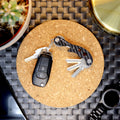 Picture of the Pocket Key Holder laid on a table with car keys attached