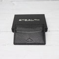 Picture of a Raider RFID Wallet next the stealth wallet gift box