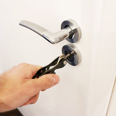 Picture of The Minimalist Key Organiser opening a door