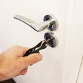 Picture of the Pocket Key Holder inserted into a door