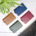 Picture showing 4 Avenger RFID Bifold Wallets laid out on a tablet in various colours