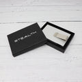 Photo of the Raptor RFID Wallet with a stainless steel money clip inside a stealth wallets gift box