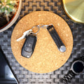 Picture of The Minimalist Genuine Leather Key Organiser with car keys attached laid out on a table