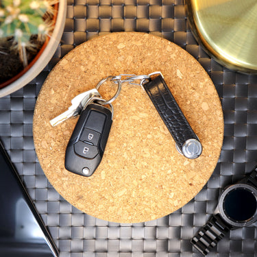 Picture of The Minimalist Genuine Leather Key Organiser with car keys attached laid out on a table